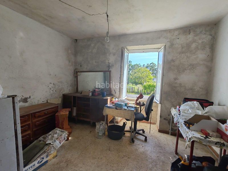 Foto cf5b563a-5533-4ea4-abe9-eb8d79bce051. Casa a Rianxo
