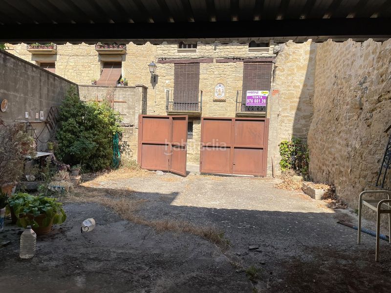 Foto c71954af-dbc5-45b9-90e9-da83ac09dabc. Casa adossada a Uncastillo
