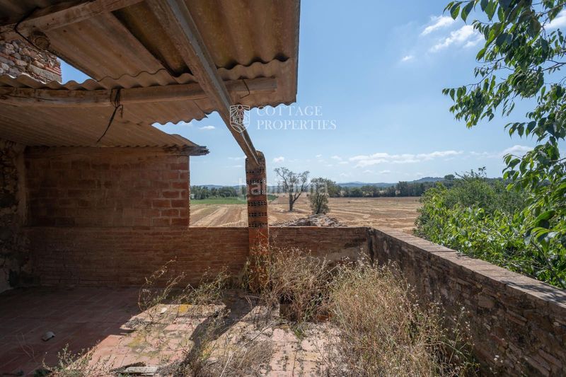 Foto e7a168d7-f22c-4177-9b43-9f57d33f1ca5. Masia a Corçà