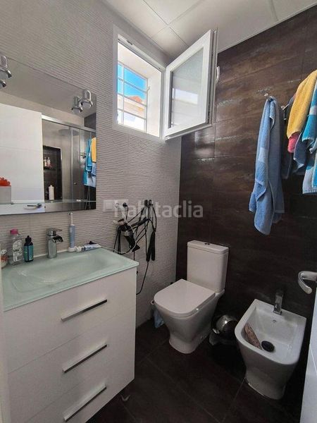 Foto 4a8c7b7c-d3a5-4755-b730-3d88ba290d6d. Casa adossada amb calefacció a Santa Isabel Málaga