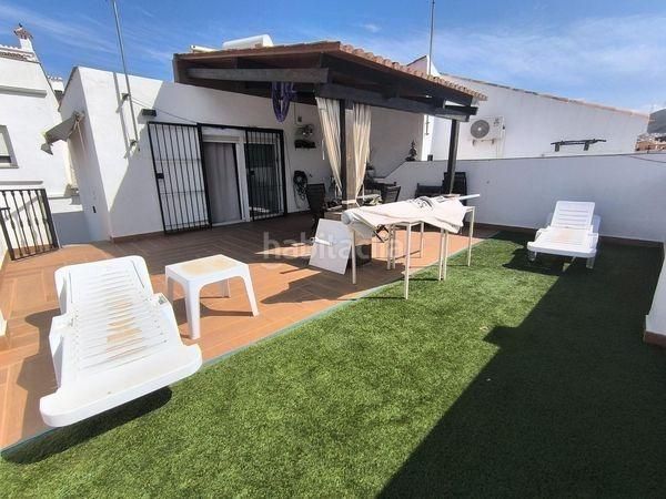 Foto c786f4f0-ea61-40b4-849c-728f6ed9edf6. Casa adossada amb calefacció a Santa Isabel Málaga