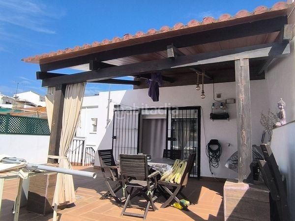 Foto f40d5ae6-c5ee-4b50-af8a-0efeefc14c7c. Casa adossada amb calefacció a Santa Isabel Málaga
