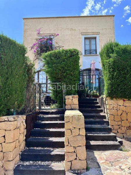 Foto 76f8920e-a276-4235-a2b9-e4ee5c0e77f8. Casa amb aparcament a Golf Bahía Finestrat
