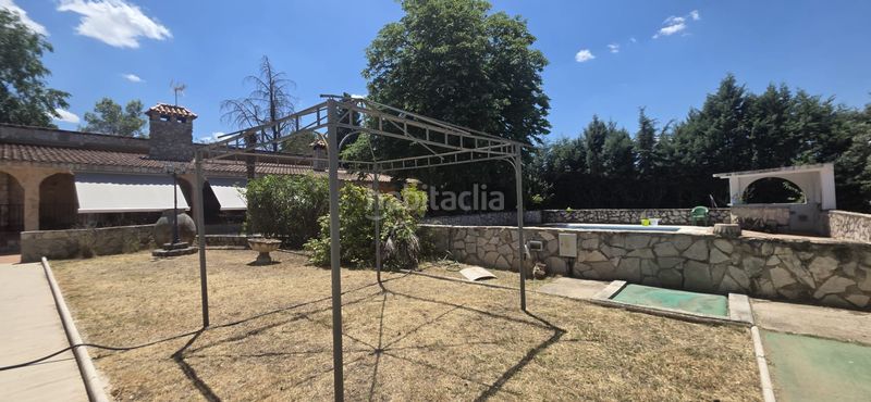 Foto eb9af1ad-acc4-44ec-bc54-6fd37ca266a3. Xalet amb xemeneia calefacció aparcament piscina a Nuevo Baztán