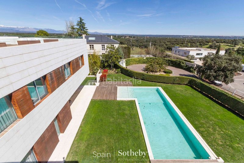 Foto 319a6219-2a76-44e8-9862-b8b77fa8c4e2. Casa amb calefacció aparcament piscina a La Florida - El Plantío Madrid