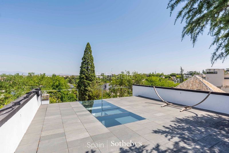 Foto 188eb41d-f8ae-4125-8f0f-7ac7c57e0cd7. Casa amb aparcament piscina a Mirasierra Madrid