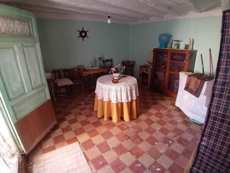 Foto 5af2d920-3b1b-4f50-82b3-afbb5edc2340. Casa adossada a Aguarón
