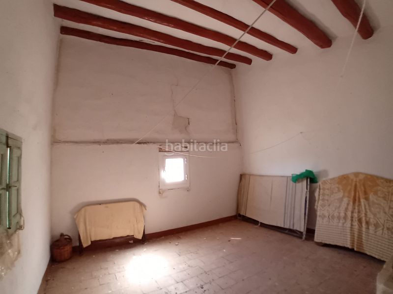 Foto c50193e8-2b8b-4396-ab9a-2a15b3ff01e0. Casa adossada a Aguarón