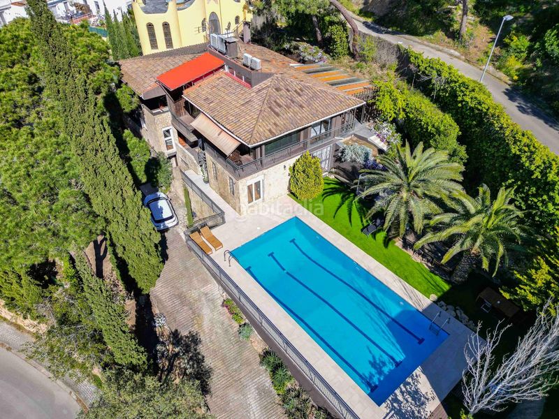 Foto bb7d663e-c480-4e4d-86ef-cde3224dc9b2. Xalet amb calefacció piscina a Canyelles Lloret de Mar