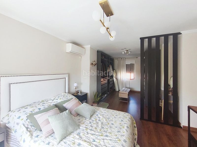 Foto dcdf6972-22a9-46a6-9176-76edfc6f2fe5. Casa aparellada amb calefacció piscina a Urbanizaciones Rivas - Vaciamadrid