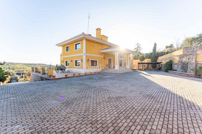 Foto f64ac8aa-8561-4876-80c7-77cb8e235b8d. Casa amb xemeneia calefacció aparcament piscina a Arroyomolinos