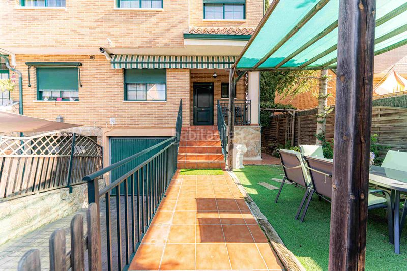 Foto 5c6ce721-a48c-4b7c-80a3-ea265d82c708. Casa aparellada amb xemeneia calefacció piscina a Arroyomolinos