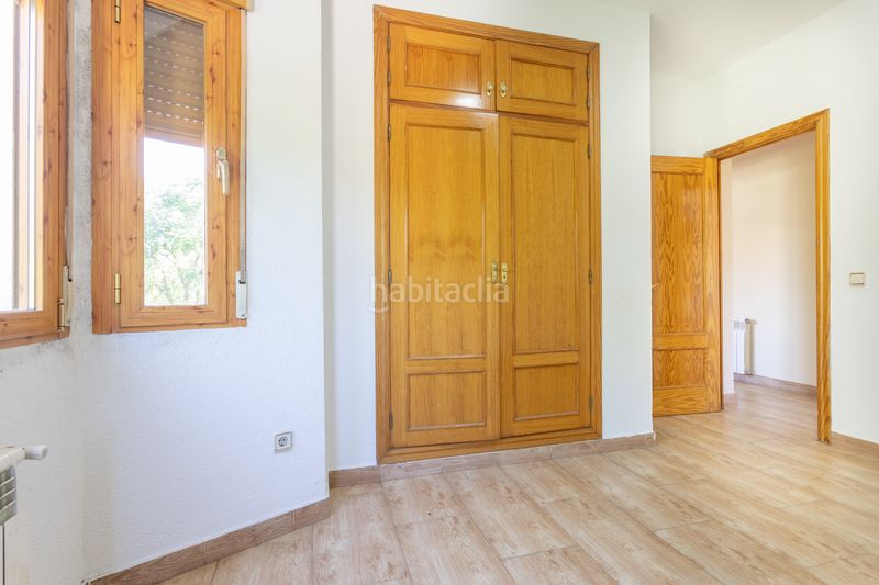 Foto 3b6c2989-acae-45aa-a434-0f76db355c19. Casa aparellada amb calefacció aparcament a Brunete