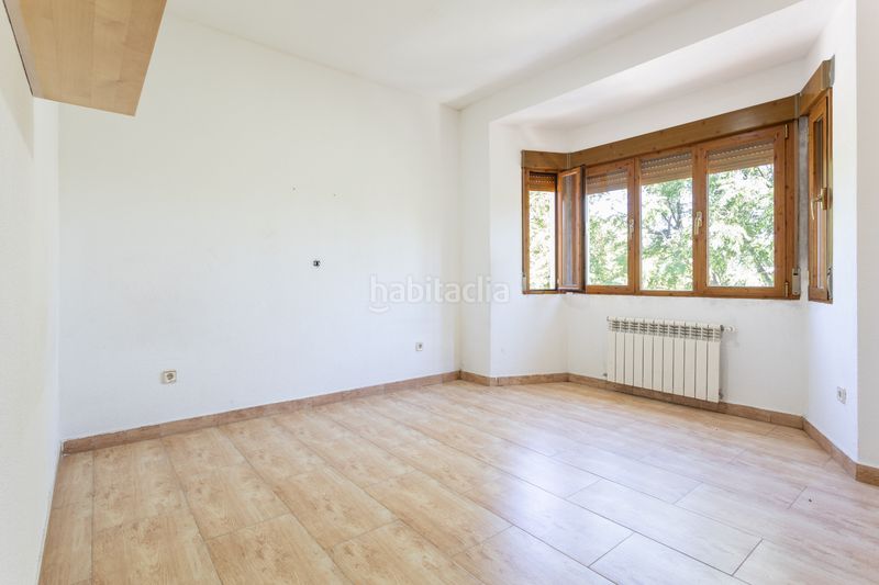Foto 5a0cf3f5-82b7-4053-82b3-922700388674. Casa aparellada amb calefacció aparcament a Brunete