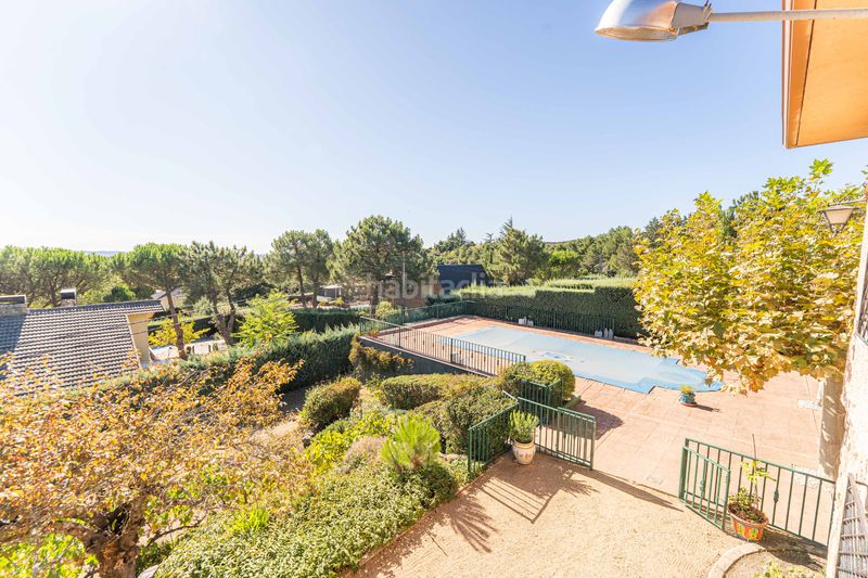 Foto ae0b853b-91b6-488d-9ba9-c165bf841d2c. Xalet amb xemeneia calefacció piscina a Guadarrama