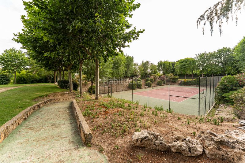 Foto 96e001c7-dc73-46f3-b286-fc0028ea81c9. Casa adossada amb xemeneia calefacció aparcament piscina a Rozas de Madrid (Las)