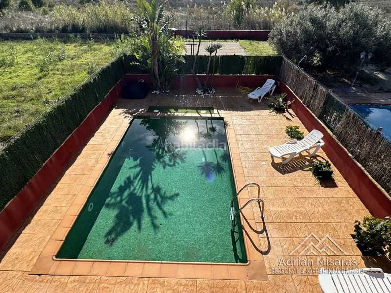 Foto b73b3ed7-ef20-4a47-a2ce-1c3d288f3fc4. Casa adossada amb aparcament piscina a Deltebre