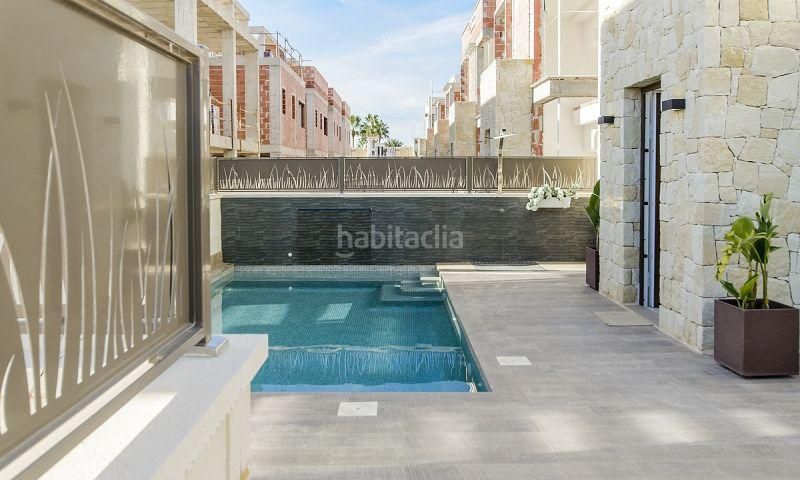 Foto 1f97b659-6504-4f49-b925-e5cb35d0a93c. Casa amb piscina a Rojales
