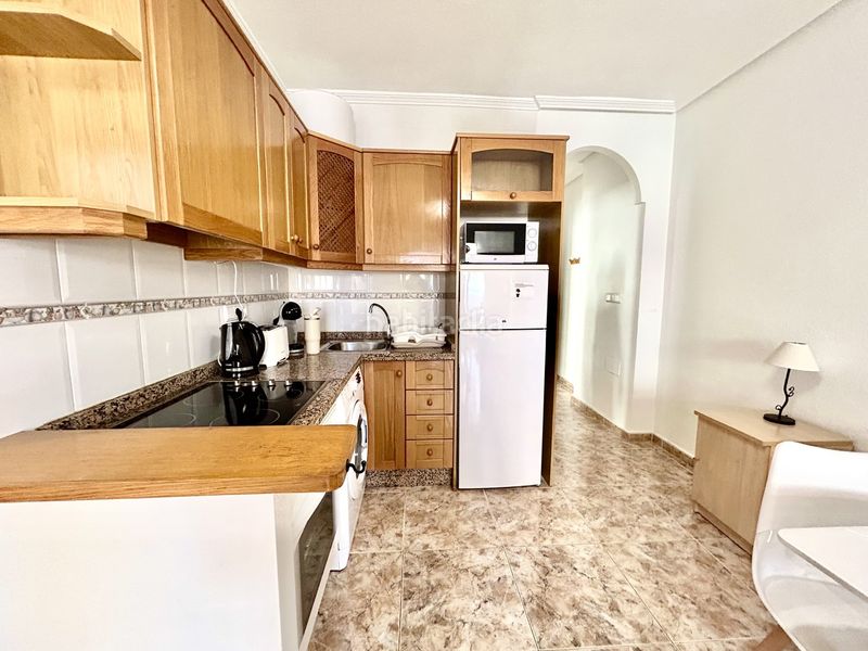 Foto 9590d7ad-26c1-47b1-8b31-de1e3c4f819a. Apartament amb aparcament a Cabo Roig Orihuela