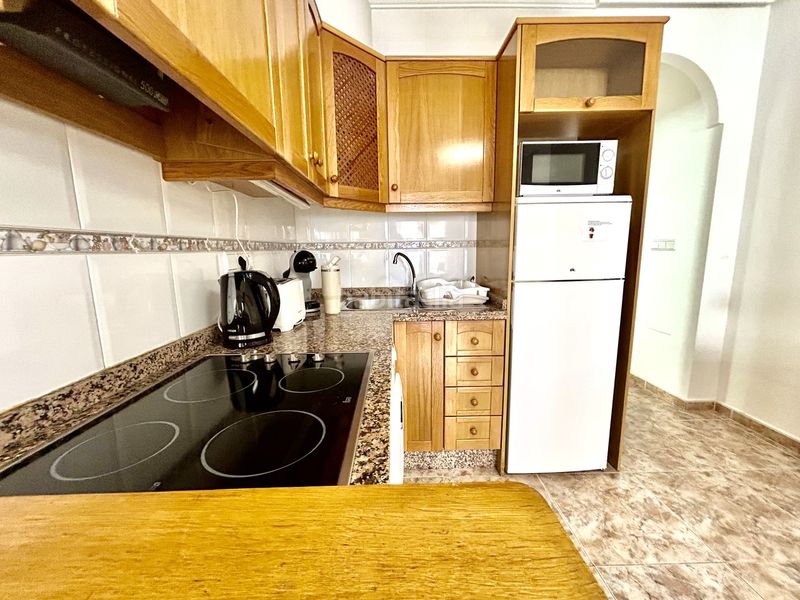 Foto da249903-7a06-4e0a-8f80-11dd1188ecc7. Apartament amb aparcament a Cabo Roig Orihuela