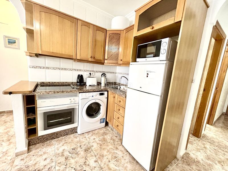 Foto f7b62ec8-c8f5-402e-8613-c4c5ecd00c27. Apartament amb aparcament a Cabo Roig Orihuela