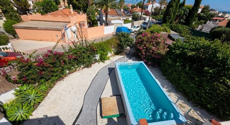 Foto 32100cfc-806b-4a38-b2ac-71d747e37761. Casa amb aparcament a Las Flores Mijas