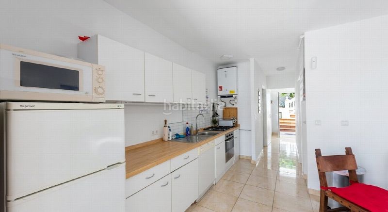 Foto 40246019-f74c-4bcf-bb9f-77319d305a59. Casa amb aparcament a Las Flores Mijas
