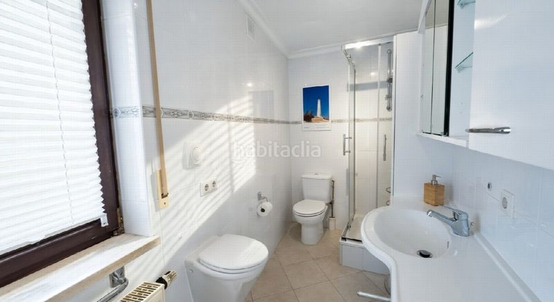 Foto 56845262-04ad-4e1e-8f7a-18fae731c41c. Casa amb aparcament a Las Flores Mijas