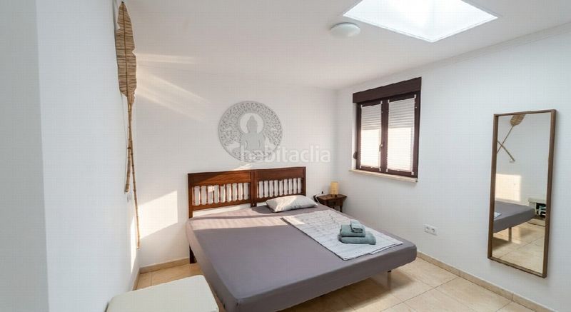 Foto 055b3885-41d9-40a1-a20b-c5d74db7a252. Casa amb aparcament a Las Flores Mijas