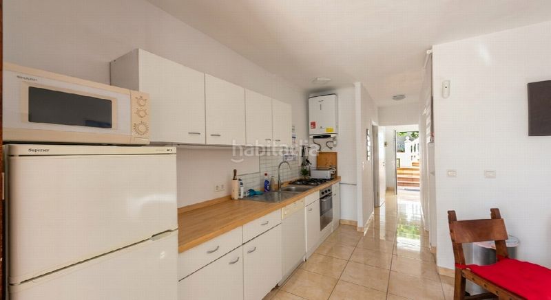 Foto 670f4459-f5a0-46f8-b856-b9089132ce40. Casa amb aparcament a Las Flores Mijas