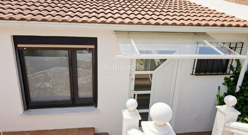 Foto ab65ccb2-8343-4068-a411-f5c16286f066. Casa amb aparcament a Las Flores Mijas