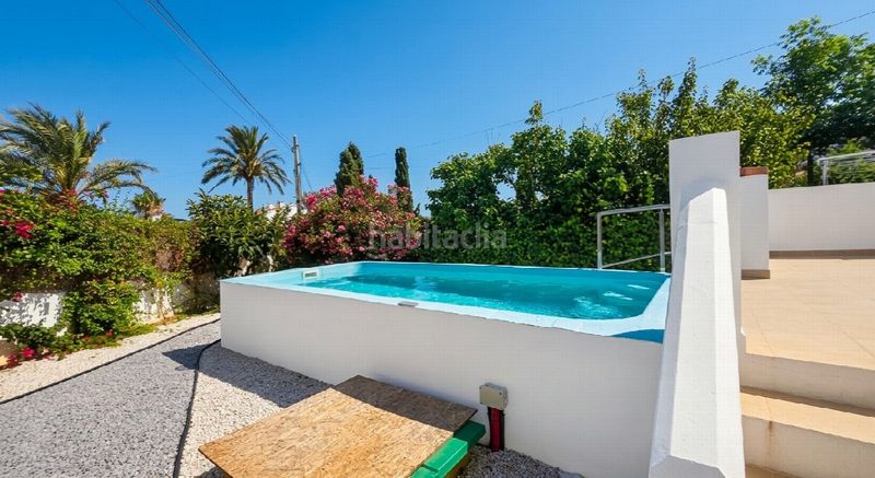 Foto bf78c943-2418-47bf-aedd-1b262ce69ed5. Casa amb aparcament a Las Flores Mijas