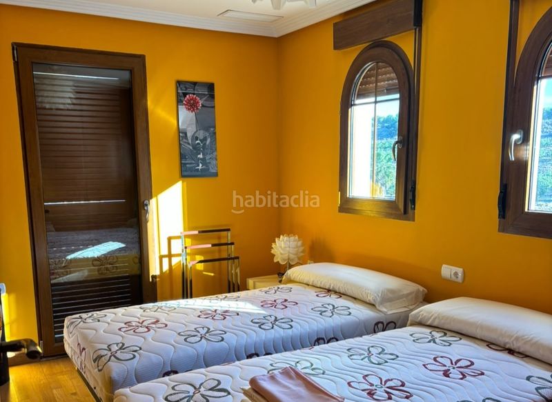 Foto b258e8f6-5c64-43a1-8f36-2d3f306f8ad7. Casa adossada amb aparcament a Algorfa