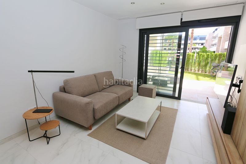 Foto 6f2fd7bc-ea33-487e-9043-46791df28957. Casa amb aparcament a Playa Flamenca Orihuela