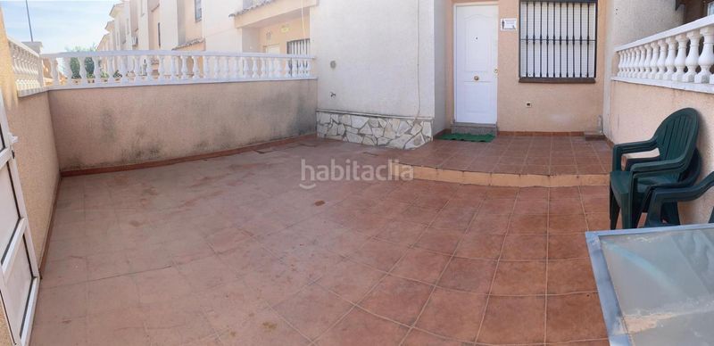 Foto 5a6bd699-dff2-4a78-840f-376c56ca606d. Casa adossada a Punta Prima Torrevieja