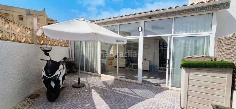 Foto 37a500e2-2022-4609-9337-a43c481daa1d. Casa amb aparcament a Playa Flamenca Orihuela
