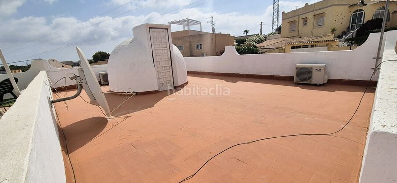 Foto 4f8dbad1-e08f-49f7-923f-35ae36aa0b05. Casa amb aparcament a Playa Flamenca Orihuela
