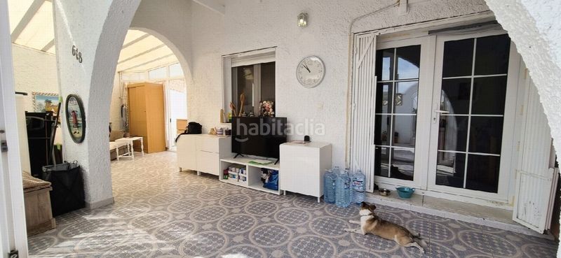 Foto a59dc007-a3dc-4aa1-a9ea-a3f7ce243293. Casa amb aparcament a Playa Flamenca Orihuela