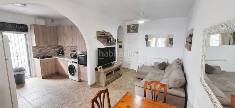 Foto ff1ba611-bad5-481a-80dd-849b2ae5b69d. Casa amb aparcament a Playa Flamenca Orihuela