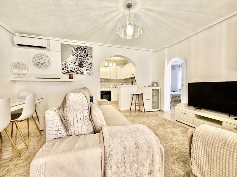 Foto b8bc548f-1aef-4511-a6aa-b4f33cf02790. Casa adossada a Punta Prima Orihuela