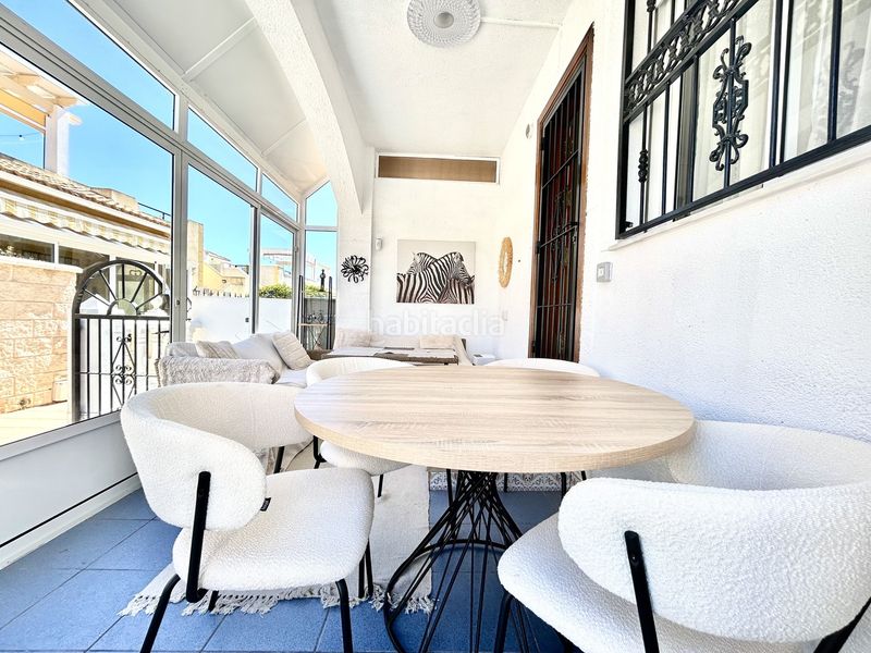 Foto bc1ce2c0-5f39-485c-82e6-359d54a88bec. Casa adossada a Punta Prima Orihuela