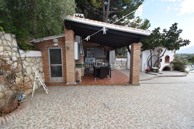 Foto 94cb02ee-40c0-4ea7-ade5-c7d69b310d62. Casa amb aparcament piscina a Coín