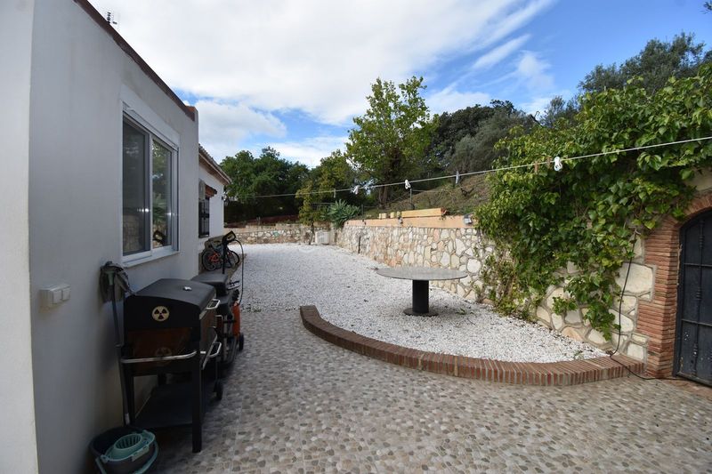 Foto fbe1565e-15fc-404e-bdeb-8e90ec4fac44. Casa amb aparcament piscina a Coín