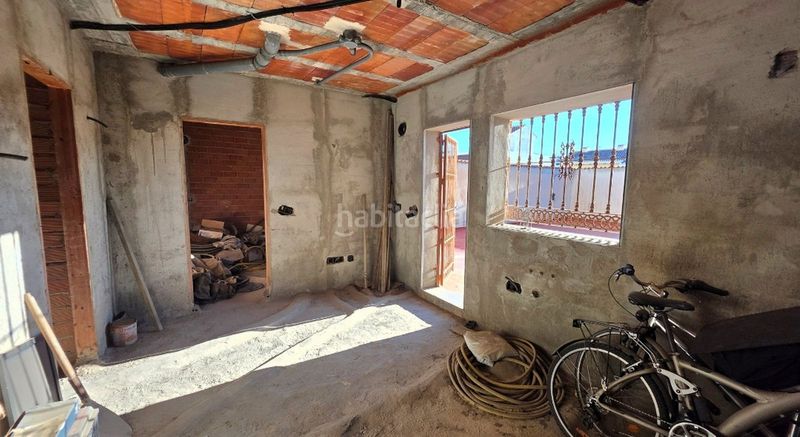 Foto 2ad00aea-e76e-4ad5-890d-8d488138485e. Casa amb aparcament a Los Boliches Fuengirola