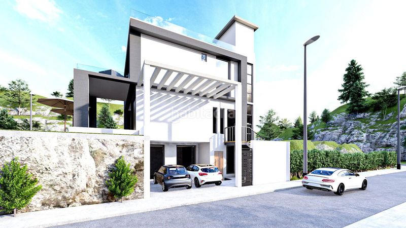 Foto 8bf0d6e2-5b6f-498d-a632-d1b36a1b9cb5. Casa amb aparcament a Las Flores Mijas