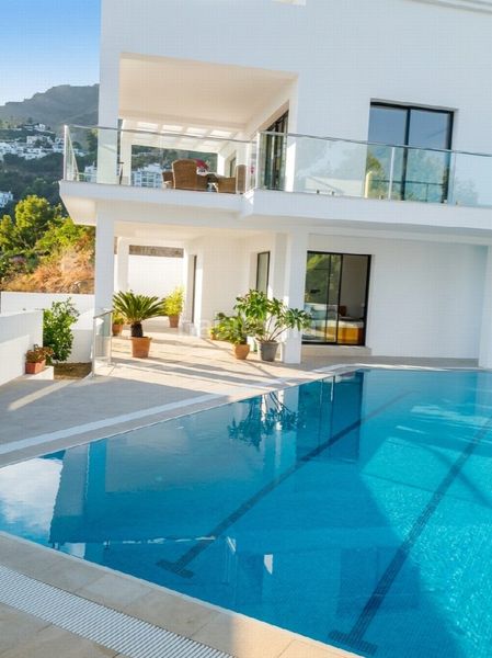 Foto 95e097c7-18b4-4616-9fda-f766de6d82db. Casa amb aparcament a Las Flores Mijas