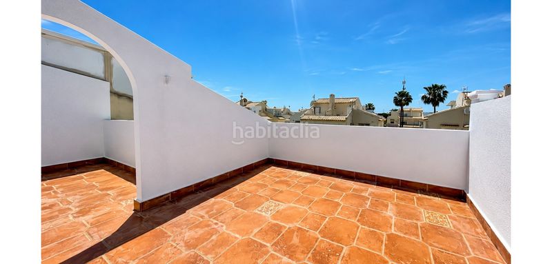Foto 2d942e18-b1ee-41a5-afea-e7e1bc82e710. Casa adossada amb aparcament a Playa Flamenca Orihuela