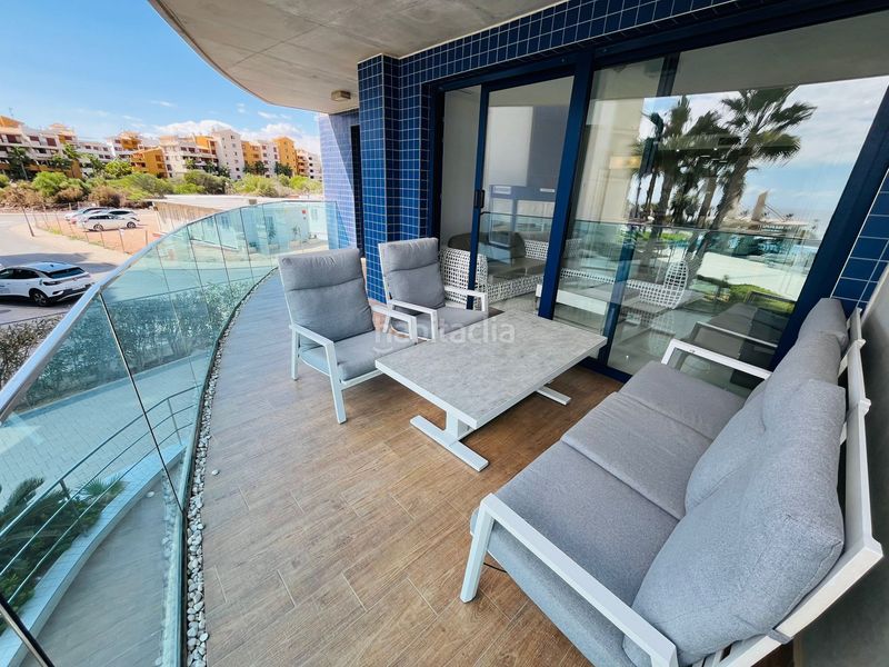 Foto 90aa35dd-fbab-4451-ab54-546252582c35. Apartament amb aparcament a Punta Prima Torrevieja