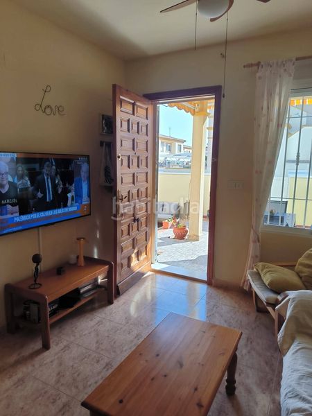 Foto 4c0df702-5bc7-4134-95ec-52744473e06e. Casa a Playa Flamenca Orihuela