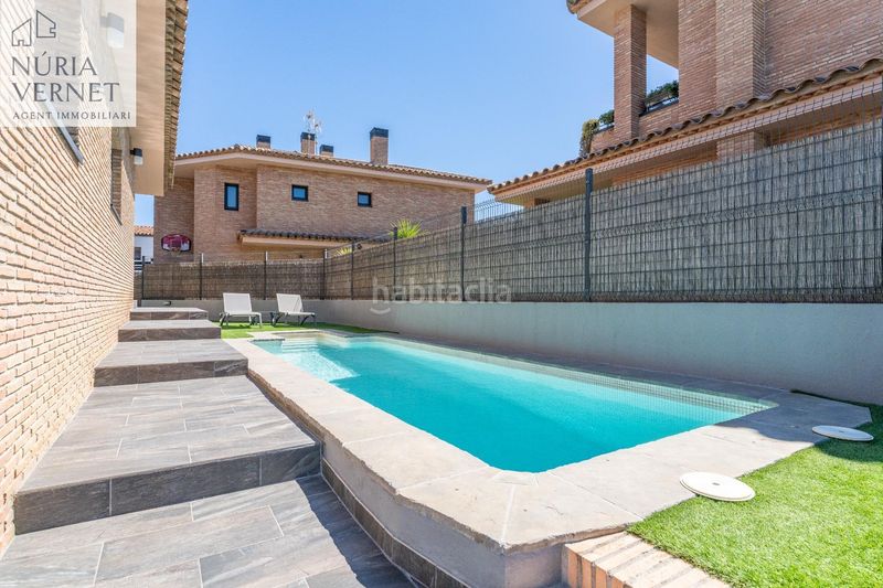 Foto 1eaf028a-8dda-4363-9f37-f33e296a2e95. Casa aparellada amb calefacció aparcament piscina a Reus